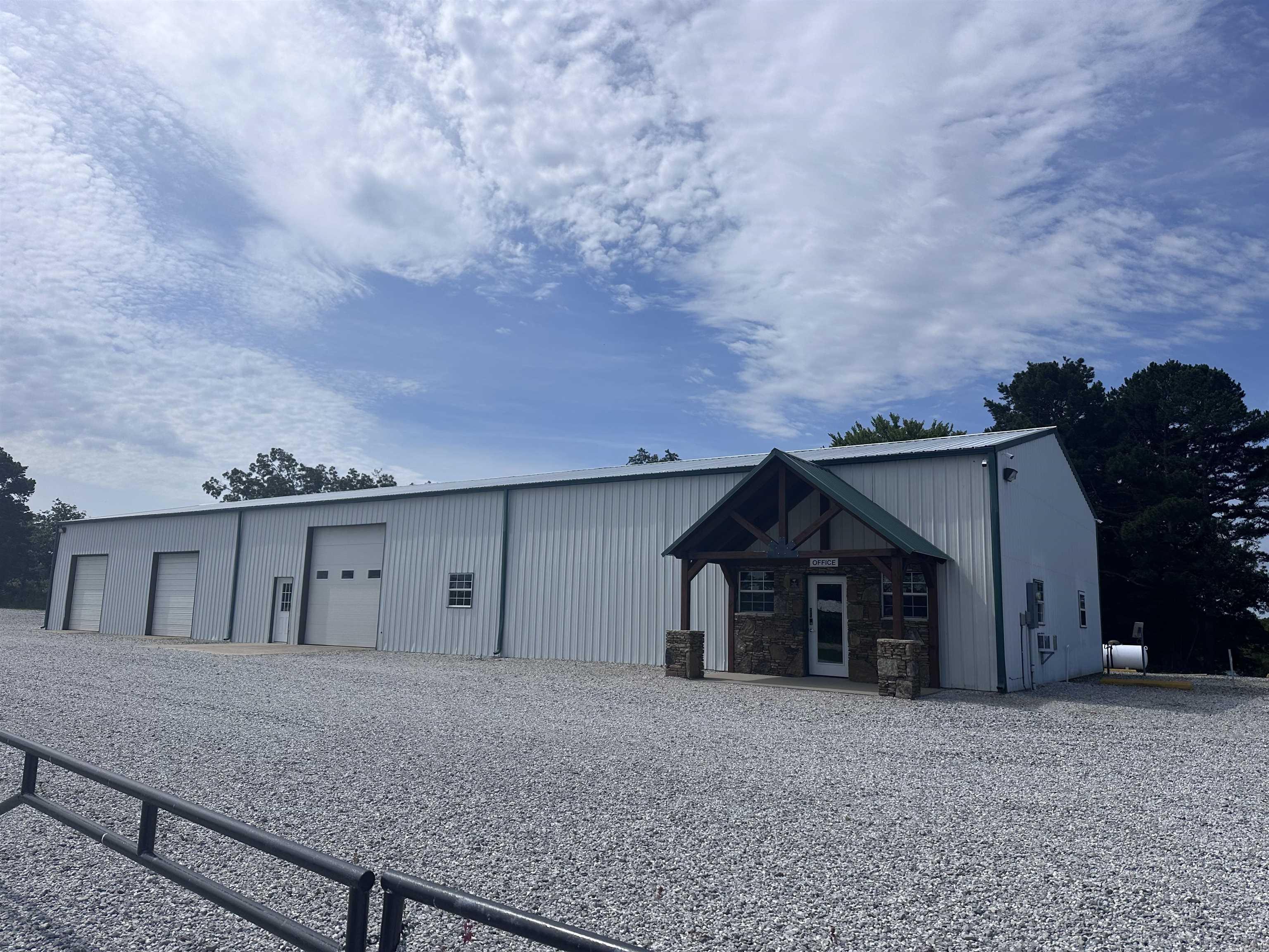 Opportunity awaits with this expansive 4,600+ square foot insulated warehouse/shop located in the heart of Concord, Arkansas. Situated on a generous lot, this commercial property offers endless possibilities for your business or investment needs. The 40 x 125 building features large open workspaces, high ceilings, and 6 wide access roll up doors—ideal for storage, manufacturing, automotive, or a variety of other uses. With solid construction and plenty of room to grow, this property is ready to support your operations or creative vision. Don’t miss your chance to own a high-utility space in a strategic rural location with easy highway access.