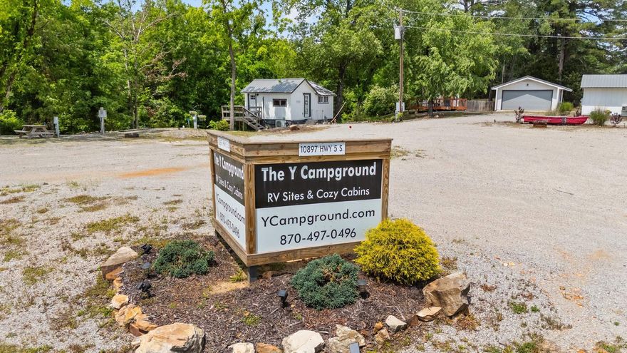 Introducing The Y Campground RV Sites & Cozy Cabins - your cozy retreat in the heart of the Ozarks! This property is just minutes from the Norfork Dam and the White River, a dream destination for outdoor lovers. It features 3 fully furnished cabins, 3 full-hookup RV spots, a dog park, and a detached garage perfect for boat storage, a camp store, or guest lounge. Whether you’re looking to run the business while living on-site or expand your portfolio, this place offers income and serenity! It’s also the perfect setup for a family or friend vacation retreat! With loyal repeat guests, online booking in place, and prime location near restaurants, fishing, and hiking, this turn-key opportunity is just waiting for the right owner. Located just minutes from world-class trout fishing spots and breathtaking natural attractions! Whether it’s business, pleasure, or a little bit of both - The Y Campground checks all the boxes!