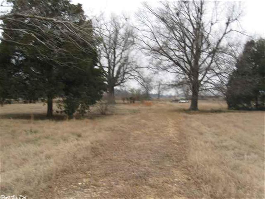 9 Acres More or Less, is just off 63 Bypass. Property has City Water, Electric, with Septic Tank on Property. Great Investment Property or Business Property.  Land is Zoned R1, but per Zoning Office, Could be rezoned C3 or Planned Mixed Uses
