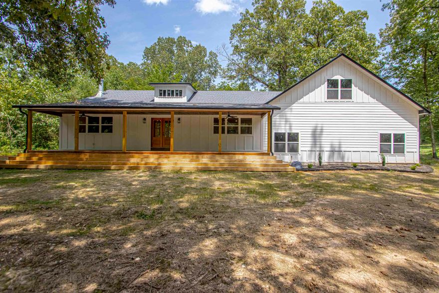 If you are looking for square footage and privacy then look no further!! This beautiful 4 bed, 4 bath home features 2 primary bedrooms, oversized garage with work space and storage, large bonus room, huge pantry, hardwood flooring and a well thought out floorplan. The left side of the home has been renovated down to the studs and the right side of the home is new construction with no expense spared to achieve that new construction quality throughout. Everything is only 2 1/2 years old including the septic system, city water supply (well still on the property), electrical, plumbing, HVAC, roof, interior finishings and concrete outside of garage (not shown in pictures). You are sure to love the private 2 acre lot that feels even bigger due to its seclusion and privacy provided by the large oak trees on the property. Enjoy country living at its finest while sitting on the huge front porch that features cascading steps, beautiful nature views of deer and other wildlife. This property also features a large shed and has plenty of room for a pool and a large shop!!