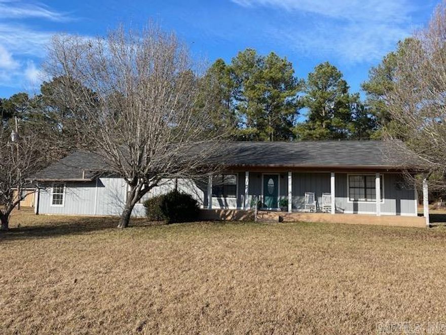 Country living at it's best! This attractive home has a living room, dining room, kitchen, den, open concept. It also has two bedrooms, two bathrooms, utility room and storage room. Exterior has been freshly painted, new roof in 2020 and new hot water heater. Outside condenser is approximately one year old and includes a NEST Thermostat