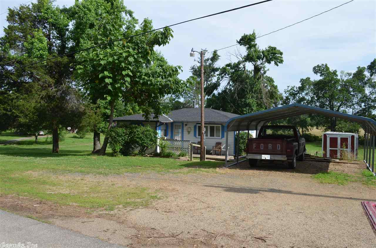 Move in ready. 2/1 home close to town that comes furnished 2 outbuildings, carport, layered deck, large garden area and lots of fruit trees. Handicap accessible with ramps and new shower and some updates with newer windows, baseboard heaters, and roof.