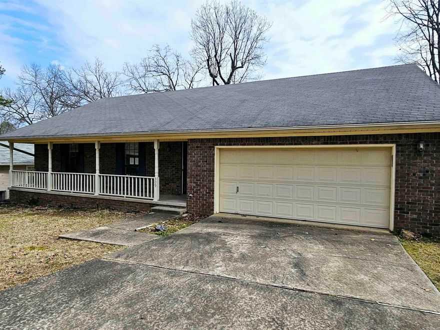 Great potential with this 3 bedroom, 2 bathroom home located in the heart of Little Rock! This home features an open floor plan, separate dining room, large kitchen, large back deck and privacy fenced back yard, and a long front porch and 2 car garage! Come see this hidden gem before it's gone! Agents read confidential remarks!