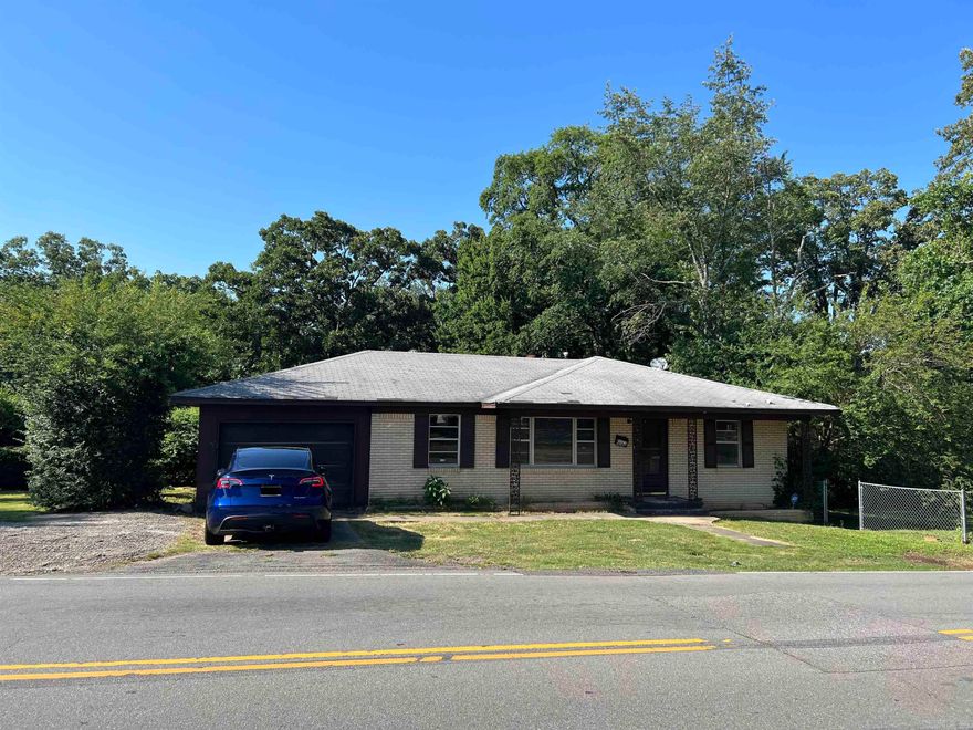 One level 3 bed 1.5 bath with 1 car garage on corner lot near UALR, directly across the street from Bale Elementary. Super convenient area, walk to UALR, shopping, dining.  Brick exterior. Hardwood floors in most of house. Needs updating, painting, etc, but seems pretty solid. Recent foreclosure, not REO or bank owned. Local corporate owner can close quickly. Sold as is, no disclosure. SEE AGENT REMARKS for offer submission info.
