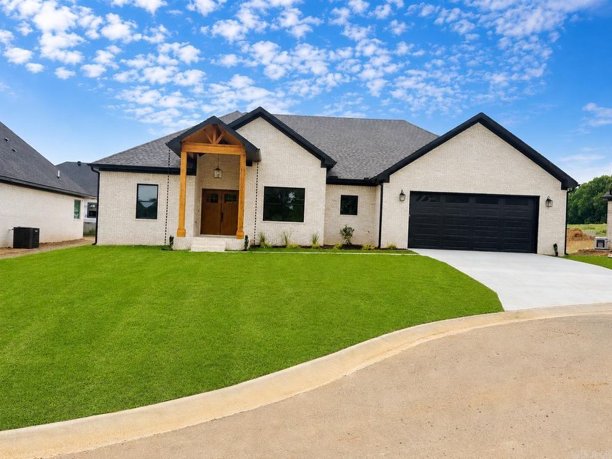 Discover this beautifully crafted new construction by Jacob Moix Construction nestled on a peaceful cul-de-sac in Windridge Estates. This 4 bedroom, 2 bath home offers 2,001 sq ft of smartly designed living space with a split layout that provides privacy and functionality. The open living, dining, and kitchen area creates a warm, inviting space perfect for gathering, entertaining, or relaxing at home. Thoughtful finishes, modern style, and energy-efficient construction make this home both stylish and easy to maintain. The primary suite is a true retreat with a spacious bath, while the additional bedrooms offer flexibility for guests, family, or a home office. Step outside to the covered patio and enjoy the level backyard—ideal for quiet evenings or weekend get-togethers. Conveniently located with quick access to Hwy 67/167, making commutes to Little Rock, North Little Rock, and Searcy a breeze. Just minutes from Cabot schools, shopping, dining, parks, and the Cabot Community Center.  Energy Efficient with Foam insulation on all exterior walls, Zip-board wrap on exterior, Tech Shield roof decking plus so much more!