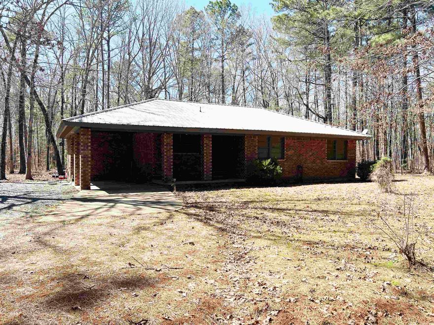 Over 4 acres in beautiful, secluded Arkadelphia! Home was a Henderson Faculty house and moved to the property. Great escape potential! Plenty of room to create your own private oasis! Property is being sold as-is. No seller property disclosure.