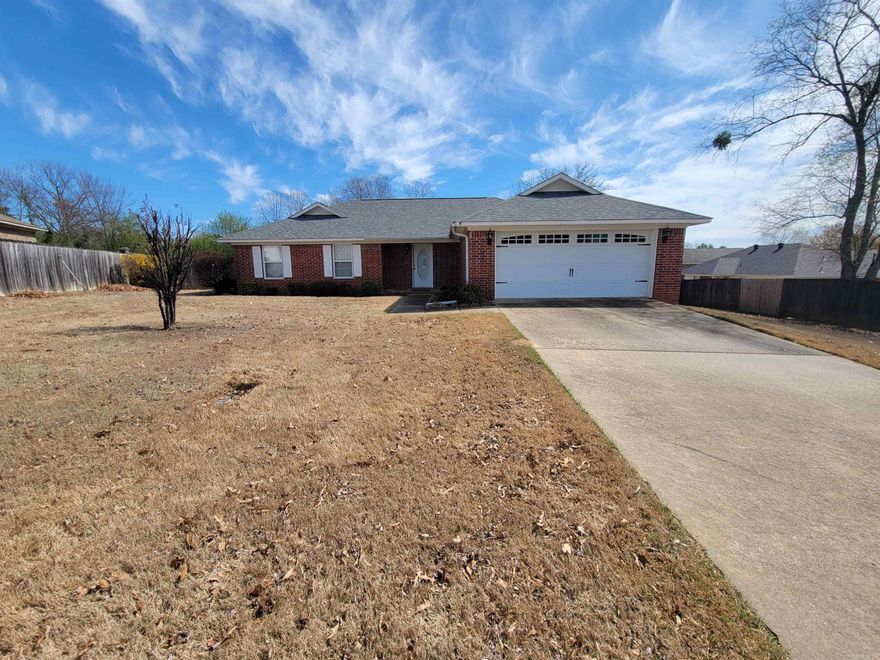 Welcome to your new home in the heart of a warm and inviting neighborhood.  When you step inside you're greeted by a spacious living room with lovely wood laminate flooring, creating a cozy atmosphere.  The split floor plan provides both privacy and functionality, each offering ample closet space and carpeted floors.  All the wet areas, including the foyer, have stained concrete flooring that has been stamped with a beautiful flagstone pattern.  Outside, you'll definitely enjoy the private back yard with covered patio.  Plus, enjoy peace of mind knowing that the roof was recently replaced in 2022.  Call to schedule your showing today!