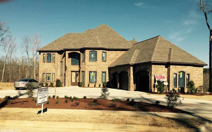 Beautiful D&D new construction-end of year completion.  Open plan w/lake view.  4 BRs, 3.5 BAs, Gameroom & Media/Bonus Room.  Great floor plan has two story grand entrance w/curved staircase, open 2 story den/kitchen, spacious rooms, large closets, beautiful moldings, 10' ceiings w/8' solid doors, Anderson casement crank-out windows, Circle drive, upgraded appliances included 60" built-in refrig., outdoor kitchen, iron railings, 2 level covered patio over looking lake-master has safe room/closet & walk-in.