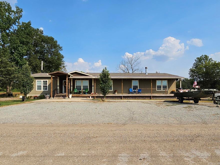 Hunters' paradise! This property is near 22,000-acre M/L Arkansas Game and Fish Commission and near Dave Donaldson WMA with 27,000 ac ml. This 4 bed 2bath home has a second family room with wood burning fireplace. The kitchen has beautiful granite countertops. Modular home is doubled wrapped insulated. 30x40 shop with electric, water and insulated. small stocked pond. Come live your hunter dreams in luxury!!