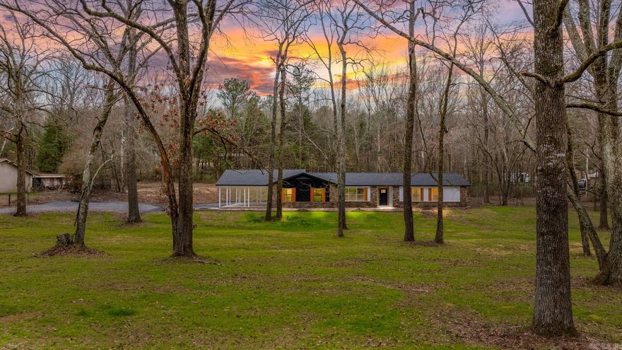 Country settting but close to everything. Totally remodeled home sittting on over an acre of land. This home has two prinmary bedrooom areas. New features and ammenities throughiut. This is a lovely must see like new home.