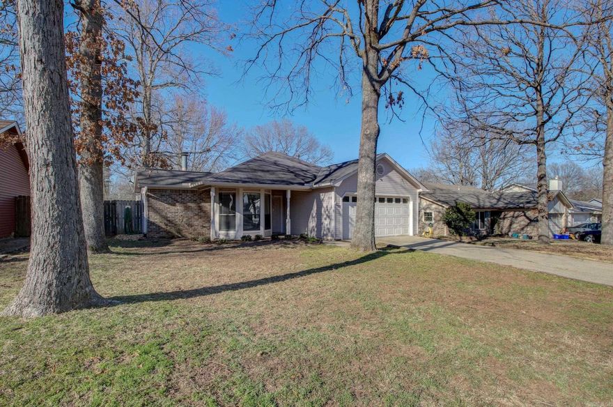 Updated Maumelle charmer with great curb appeal and lots to offer its new owner;  3 bedrooms, 2 updated full bathrooms, and updated laminate flooring throughout;  Updated eat-in kitchen with stainless appliances, granite counter tops, ceiling height cabinets, GE profile surface range, built in microwave, double ovens, pantry, and stainless fridge that conveys; Spacious living area with wood burning fireplace and new sliding glass back door that leads to the back patio;  Generous sized master suite with dual closet spaces; Flat lot with mature trees, French drainage system, large covered front porch, fully wood fenced, guttering, floored attic space, and two car enclosed garage with auto opener; This one shouldn't last long, so come see it today!!!