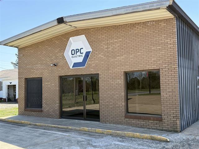 Great space available for sale (or lease- see mls 25013076) on the west side of town with great road frontage! Store front with office area and 1/2 bath in the front of the building with a warehouse, extra room, and 1/2 bath in the back. Two additional rooms are upstairs. The warehouse area is heated and cooled, has 220 outlets, and a manual, spring assisted, insulated bay door. The track is still installed for a second door. The roof has been sealed, the electrical system has been updated and/or repaired, and junction boxes were all checked while the current owner has owned the property.