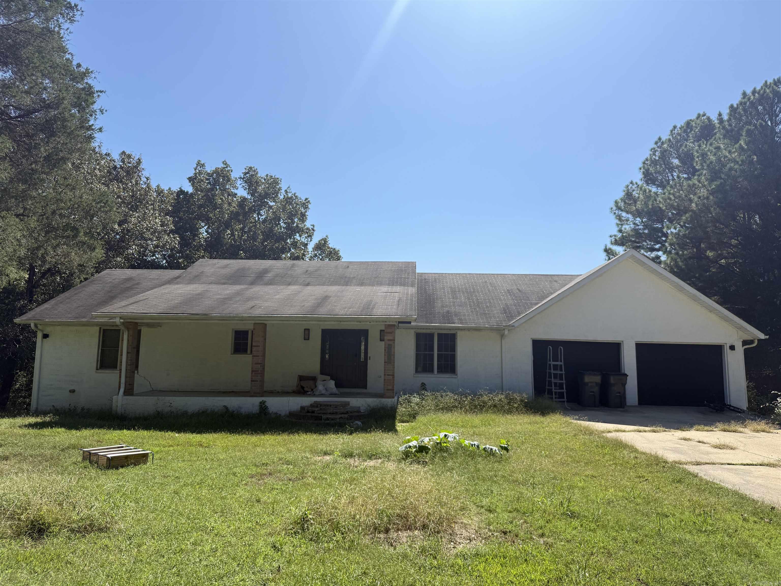 Spacious Home on 3 Acres with Endless Possibilities! This 4,176 sq ft home offers incredible potential with up to 7 bedrooms, 3 baths, and 2 laundry rooms! The main level features 3 bedrooms, while the walkout basement includes 4 additional bedrooms, a large kitchenette, and a game area. There’s plenty of room to spread out and make it your own with lots of closet space, a deck for relaxing outdoors, and room to grow on 3.01 beautiful acres. Some updates have been started, giving you the opportunity to finish it out with your own personal touch. With its generous space and layout options, this property is ready to become a truly stunning home! Offered at $259,900 — come see the possibilities today!