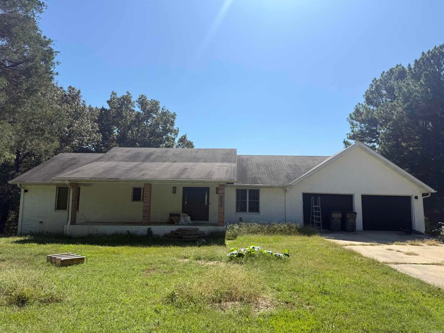 Spacious Home on 3 Acres with Endless Possibilities! This 4,176 sq ft home offers incredible potential with up to 7 bedrooms, 3 baths, and 2 laundry rooms! The main level features 3 bedrooms, while the walkout basement includes 4 additional bedrooms, a large kitchenette, and a game area. There’s plenty of room to spread out and make it your own with lots of closet space, a deck for relaxing outdoors, and room to grow on 3.01 beautiful acres.  Some updates have been started, giving you the opportunity to finish it out with your own personal touch. With its generous space and layout options, this property is ready to become a truly stunning home!  Offered at $259,900 — come see the possibilities today!
