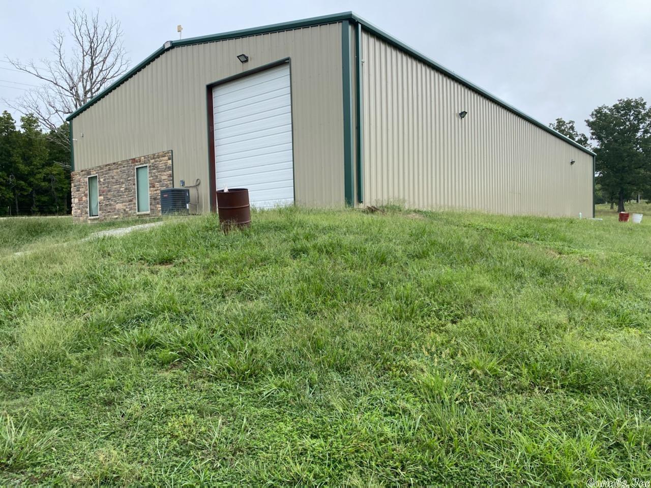 COMMERCIAL BUILDING WITH HWY FRONTAGE FOR SALE Property is located at 16704 Hwy. 62-412 at Gepp, AR. The commercial building sits on 5 acres M/L. The building has approximately 5,000 sq. ft. of area. It includes an office area, bathroom and small bedroom. Also included is a storage area above the office area. The building is insulated and would be great for your commercial business. It has a great location with US Highway frontage with high traffic exposure. Mtn. Home and Lake Norfork only 15 min. away.