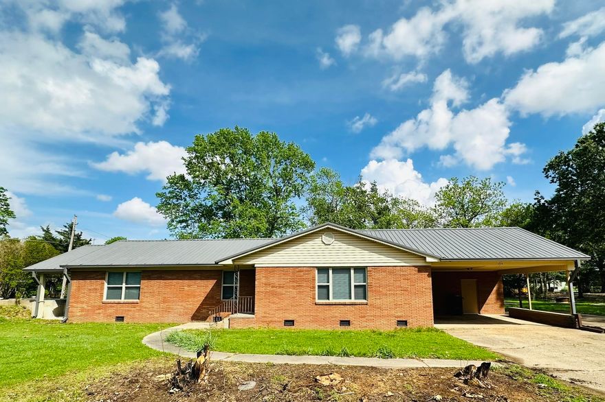 Welcome to this spacious and well-maintained 4-bedroom, 2-bathroom home, offering 1,788 square feet of comfortable living space. This charming residence features a durable metal roof and newer windows throughout, ensuring energy efficiency and low maintenance for years to come. A key highlight of this property is the storm cellar, providing added safety and peace of mind during severe weather. The layout is designed for both functionality and comfort, with generously sized bedroom and versatile living areas perfect for families or entertaining. Don't miss the opportunity to own a home that combines modern updates with practical features in a desirable setting