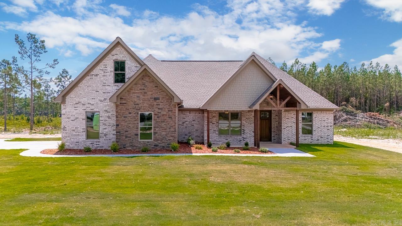 NEW SUBDIVISION IN EAST END COMMUNITY!!! Drake Trail Estates.....Are you looking for easy access to the freeway? Only 20 min to downtown Little Rock. This is a perfect location and great school district as well as community. This home features 4 main bedrooms downstairs, one could be an office. Bonus room upstairs with a nice closet or could be used as a 5th bedroom if needed. No carpet. As you walk into the entry way you are greeted with an open area showing off a beautiful gas log fireplace, open to large customized kitchen, lots of cabinets and walk in pantry. The kitchen has a gas stove with wall microwave and oven. Stainless steel appliances. Quartz countertops and custom painted cabinets. The primary bedroom is split plan from other rooms. The primary bathroom is large with a custom tile shower, separate vanities, soak tub. The primary closet is huge with lots of built in dresser space. Exterior is all brick with a small amount of hardie board to give the perfect curb appeal. The front porch is perfect for those rocking chairs and the covered back porch will be great for grilling out with a super large yard. Plenty of space for that shop and pool to be added.
