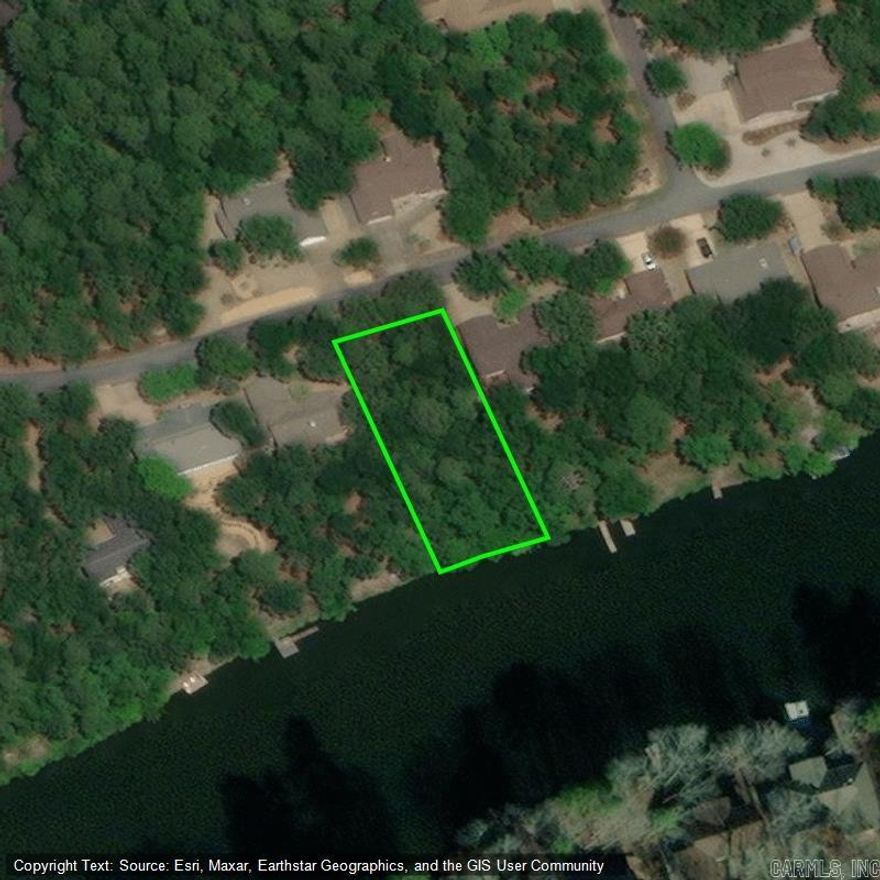 Lake Pineda WATERFRONT! Build your dream home on this affordable 1/3 acre Lake Front lot in 26,000 gated acres Hot Springs Village. Great fishing in this 62 acre lake too! With 11 Lakes & 9 Golf Courses to enjoy, the Village offers Tennis, Pickleball, Mini Golf, Bocce Ball, Lawn Bowling, Dog Park, Archery Range, Fitness Center, Indoor & Outdoor Pools, Performing Arts Center, 2 Beaches and Marinas, 20+ Miles of Walking Trails, Restaurants, Churches, and more!