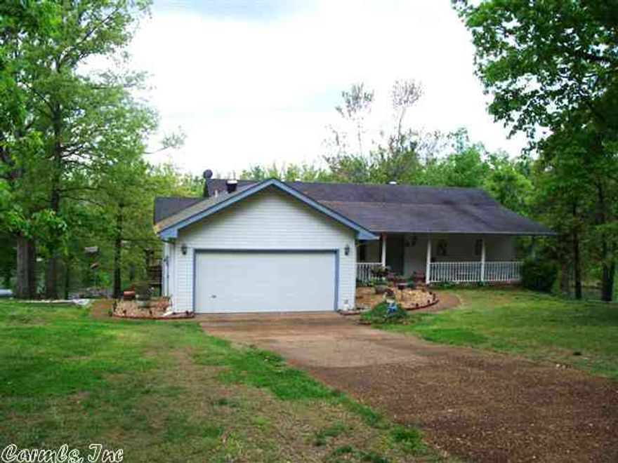 LAKE FRONT HOME - over 3000 Sq. ft. Oakwood flooring. Kitchen has beautiful cabinets & lots of counter space, formal dining room, large living rm w/fireplace, family room in lower level with wood burning f/p and leads to a 30x16 deck.  Master bdrm up, guest down with possible 3rd bedroom down- no closet - 3 bathrooms. Foundation closed piers. Whole inside was painted end of 2013.  Walk out basement w/nice size work shop w/dbl door to outside.  Lot size & room dim. are approx. & rounded down.