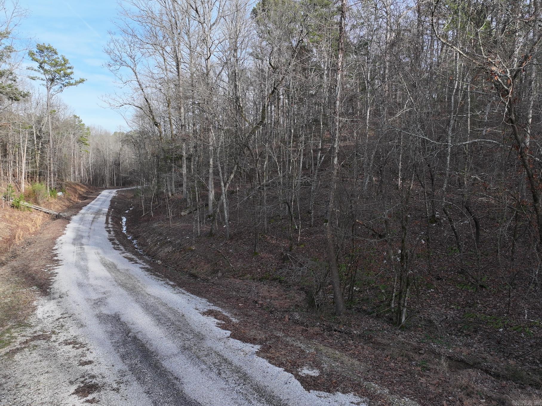Looking for the perfect spot to build your dream home? Just 1 mile to Lake Ouachita, Lot 17 offers 3.67+/- acres and is located in the gated community of the Denby Cove Subdivision in Mount Ida. With city water and underground electric already in place, this property is ready for your new home! Enjoy the convenience of paved roads and the natural beauty of the area, just minutes from Lake Ouachita and a short drive to Hot Springs.