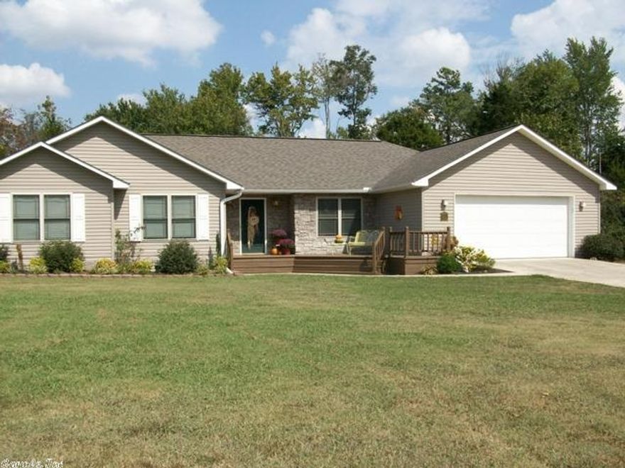 Very open plan, large eat in kitchen with huge island, pullouts and tons of cabinets, formal dining room, lots of recessed lighting in LR, blinds throughout, pretty foyer, Jacuzzi/separate shower in master, walk in closet, Nice front deck and large multi level back deck, new gutters, detached shop is wired & has keypad. Brand new underground storm shelter built in under the garage floor. Large storage area in the back of garage with exterior door to back deck. Huge yard at the end of the cul de sac