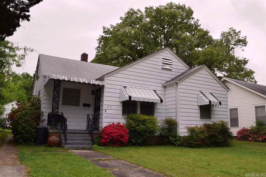 Cute, cute bungalow in the heart of Parkhill! Quiet street & a level yard - fenced in back w/ detached garage & work shop. Cozy living room flows to study and formal dining room w/ French doors leading to bonus rm or large bedroom. Updated kitchen w/ pretty wood cabinets (oak), gas range & work island. Ceramic tile in bath. Hardwoods throughout. Doll house!