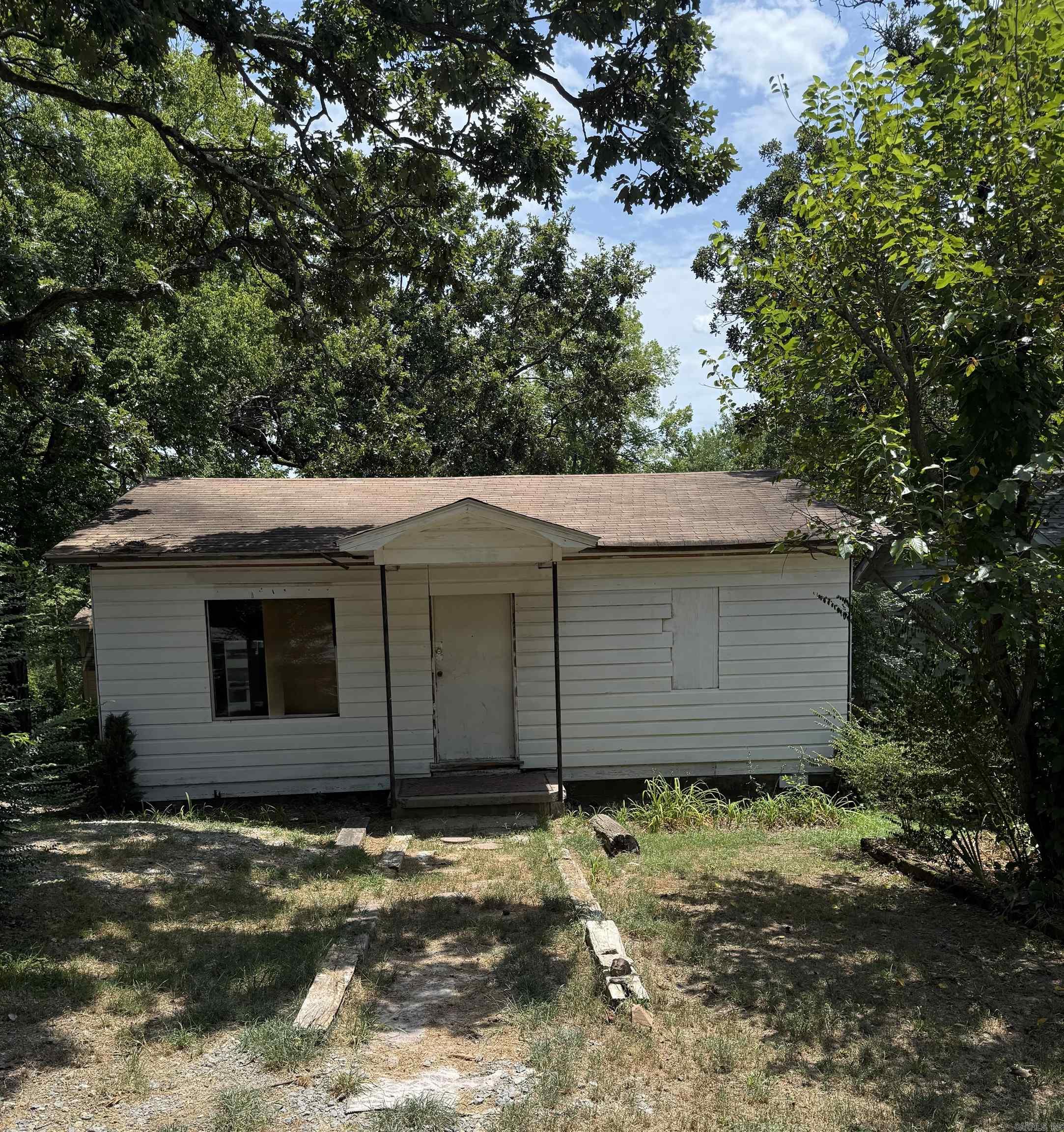 Bring your vision! Two homes side by side! Location, potential, and opportunity all in one package! Positioned in the heart of Little Rock’s Capital View area. This home is being sold as-is and offers incredible upside for the right buyer. Just off Markham Street, you’re minutes from downtown, midtown, Hillcrest, and the Kavanaugh corridor—perfect for anyone wanting convenience and charm in one of Little Rock’s most walkable neighborhoods. The home is in need of some TLC, but the potential is undeniable. With ample lot space and the possibility to expand or redevelop, this is a unique opportunity to bring your vision to life in a high-demand area. Whether you’re an investor, a first-time buyer with a creative eye, or looking to restore and personalize your next home—don’t miss this rare chance to own side-by-side properties in a prime location. Neighboring home 127 N. Schiller is listed as well. Great lots. Great location. So much potential. Schedule your showing today!