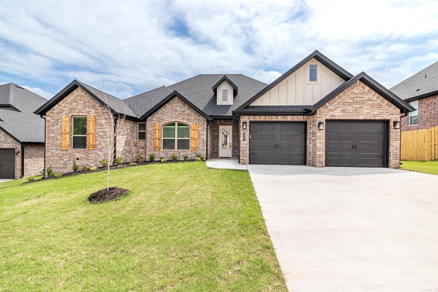 Smartly designed, new construction home with open concept floor plan! Some features include a gas fireplace, solid surface flooring in the living areas, ceramic tile in the wet areas, carpet in the bedrooms, granite counters through out, stainless appliance package, covered back porch with wiring for cable and plumbing for gas grill, cellulose insulation, low e windows, insulated garage doors, gas water heater, privacy fenced back yard, full gutters, 2" faux wood blinds, and more.