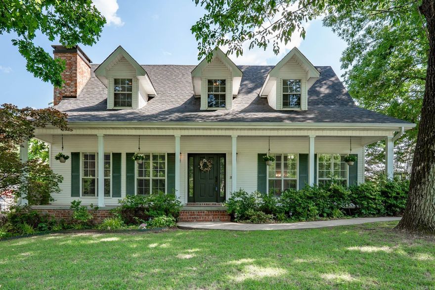 Beautiful 2-story 3 bed, 2 1/2 bath Benton home w/stunning front porch. Large open living area w/gas log fireplace w/beautiful mantle & surround. Kitchen & dining area are bright & functional. Kitchen features white painted cabinets, stainless steel appliances, double oven, new dishwasher, peninsula/bar seating area & ample seating/dining space. The primary suite is large & bathroom features separate vanities, tub, walk-in shower and walk-in closet. The bathroom includes Main level laundry room & half bath. Two bedrooms upstairs w/shared full bath & 3 dormer nooks waiting to be personalized. Covered portico, 2-car garage w/ample storage & built-in shelving. Located in a desirable area, near the golf course, easy access to I-30 between Alcoa and Congo exits. Roof is less than 10 years old; HVAC & water heater less than 3 years old. New fencing in back yard and the landscaped home features multiple varieties of Japanese maples, mature oak & pine trees, blooming pink azaleas & more.