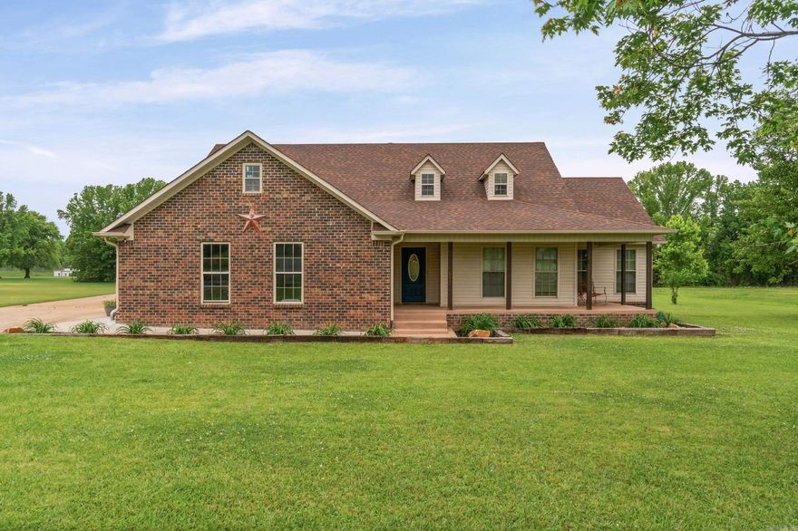Welcome to 112 Mildred Lane in Beebe—an updated 4-bedroom, 2-bath home offering over 1,900 sq ft on a full acre with a peaceful country feel. This well-maintained property features fresh paint, durable life-proof vinyl flooring, and an open-concept kitchen with a large bay window for natural light. The spacious living area and primary suite both showcase tray ceilings, while the upgraded primary bath adds a modern touch.  Enjoy outdoor living with a large A-frame covered patio over a 20x20 concrete slab—perfect for entertaining or relaxing. The property also includes a huge 2-car garage, ample space for a shop or man cave, and a scenic view of a private pond shared by a neighboring owner. Additional highlights include a wood-burning fireplace, two water heaters, and a roof replaced approximately 5–6 years ago.  A rare combination of space, updates, and serene surroundings—don’t miss this opportunity.