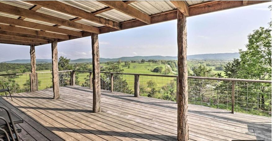 Featuring three generously sized bedrooms and two beautifully designed bathrooms, this retreat is perfect for relaxation. Step outside onto the expansive, covered deck, where you can soak in the stunning views of the idyllic landscape and the soothing sounds of Crooked Creek flowing nearby. The back porch offers a picturesque view of a vast valley, where you may spot deer gracefully moving through the meadow below. For those who enjoy fishing, the cabin offers easy access to the renowned White River, while nature enthusiasts can explore the nearby Ozark Mountains, which are home to scenic hiking trails. Conveniently located just a short distance from Cotter and the White River, this cabin allows you to experience the charm of local shops and the welcoming atmosphere of a small town. Inside, you will discover a delightful fusion of rustic charm and modern amenities, ensuring you have everything you need for a truly relaxing getaway. 1.60 AC M/L$285,000