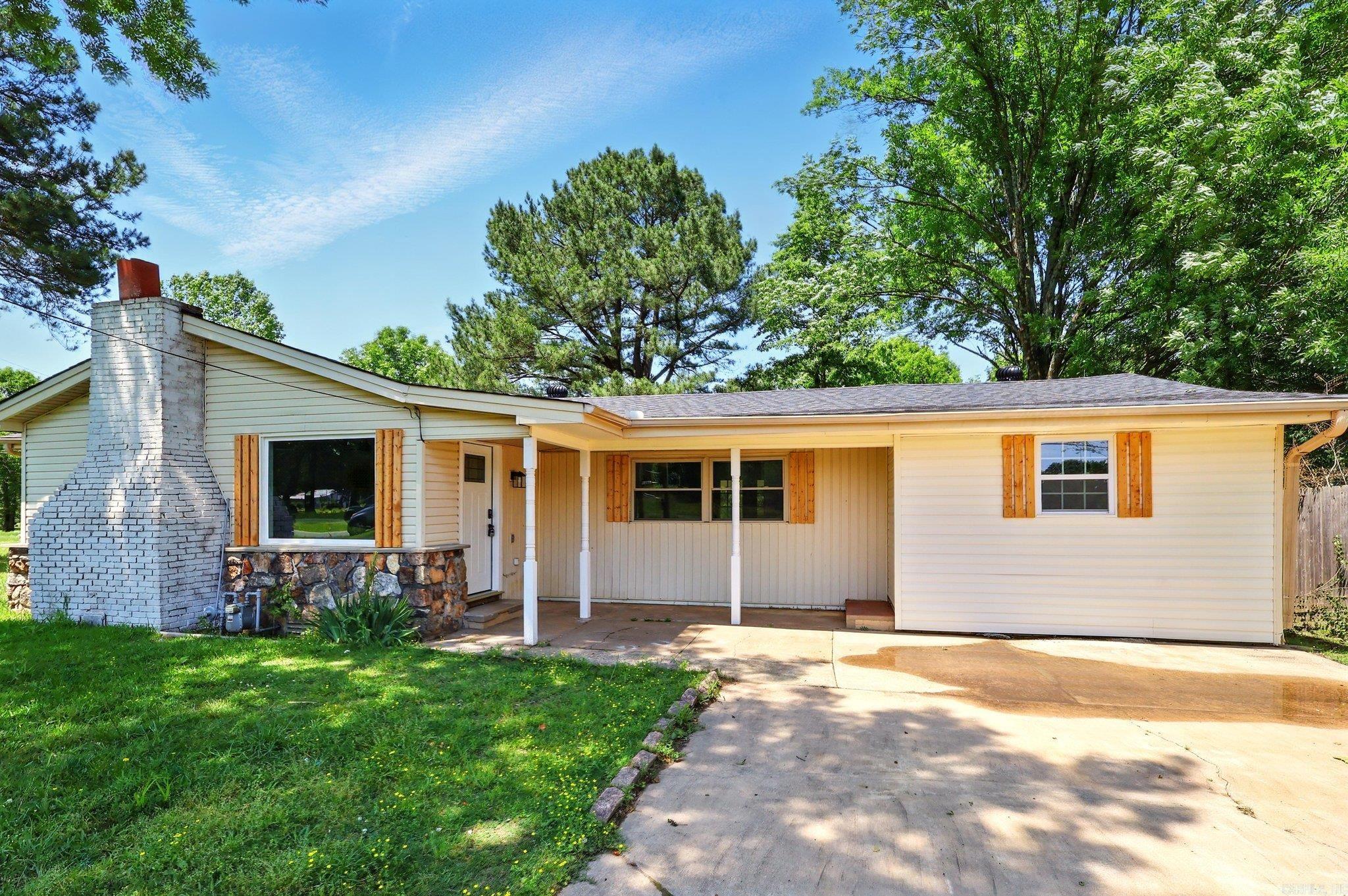 Stunning Fully Renovated Home on 1.67 Acres. Fully renovated 3 bed, 2 bath home on 1.67 acres with modern upgrades throughout. New roof, luxury flooring, updated kitchen with new cabinets and fixtures. Smart home features: app-controlled garage door, entry doors, and ceiling fans. Living room with fireplace, dining area, and extra flex space ideal as a family room, den, or great room. Detached 1-car garage with automatic door, 2 additional parking pads. Includes a large shop for DIY projects, bonus game room, dog house, underground storm shelter, and newly built deck. Property also features a horse stable and plenty of open yard. Fresh landscaping with curb appeal. Move-in ready, with style, function, and space for creativity.