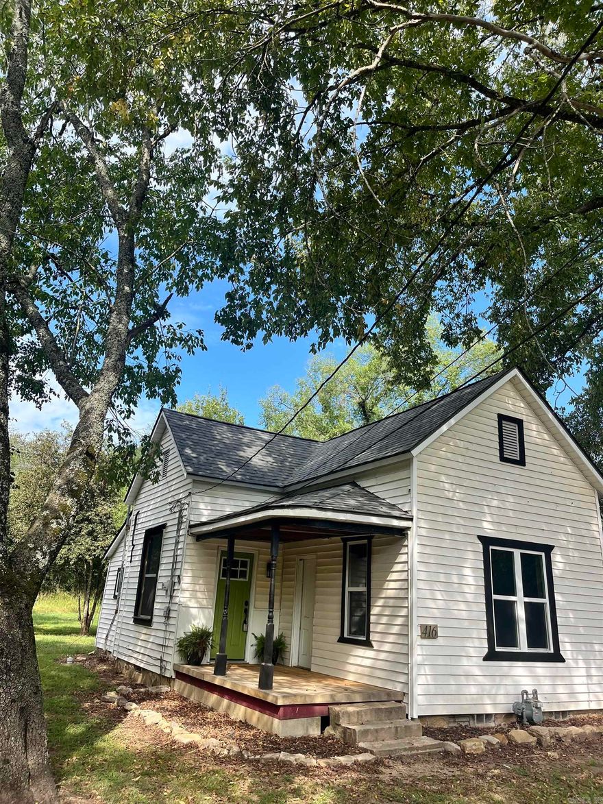 Located within walking distance from shopping, restaurants, and the town square of Yellville, this home offers convenience and seclusion right intown! A newly installed privacy fence located on a dead-end road, creates a calm feeling just minutes from the action! This 2 bedroom 2 full bathroom house is full of charm! Completely renovated with fresh flooring, light fixtures, new double pane windows, new heat and air and new roof. Large bedrooms and high ceilings throughout are sure to make you feel at home. Outside features a huge level lot with tons of building potential for a shop, shed, or even a pool!
