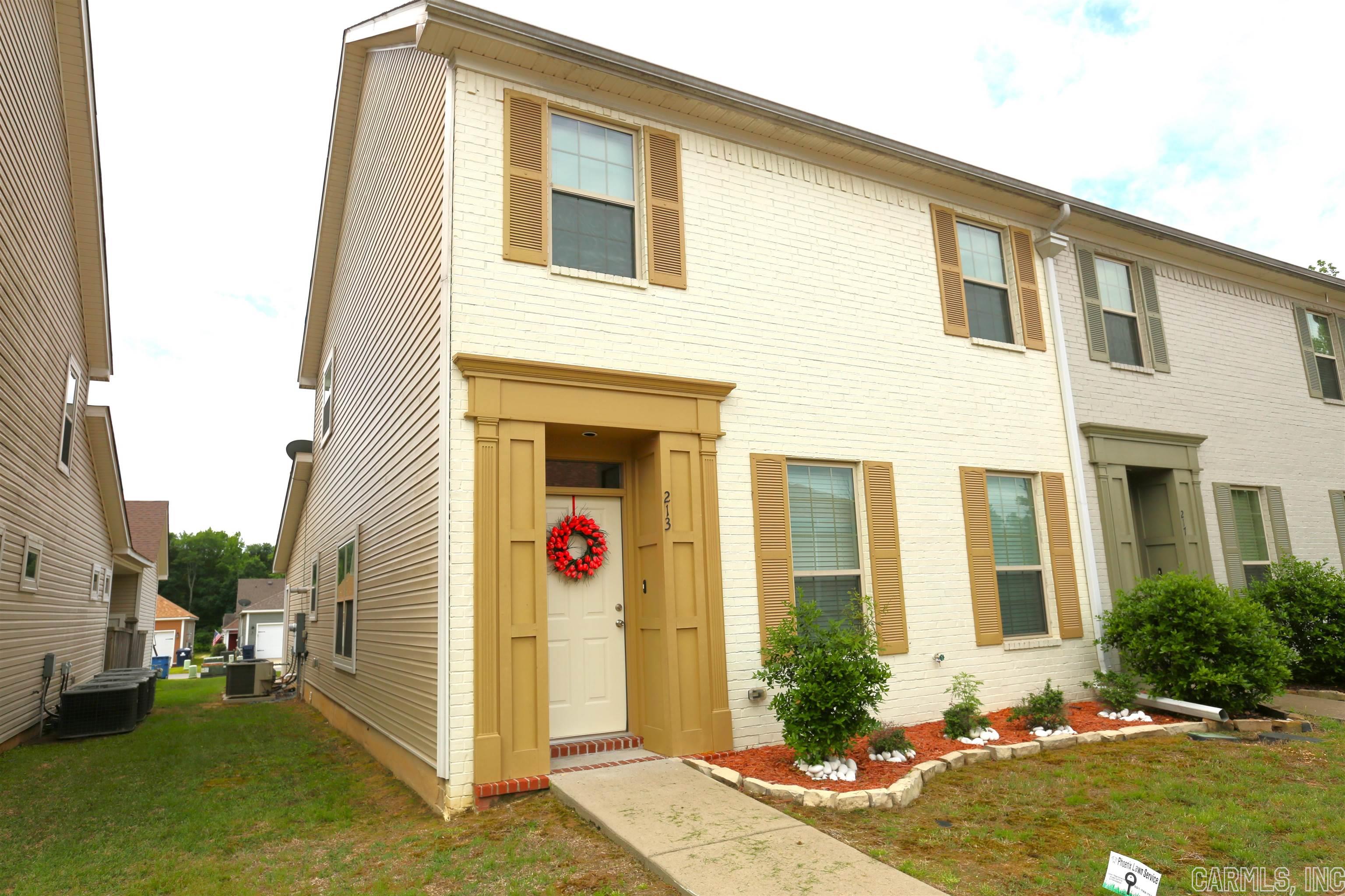 Come and see this charming craftsman style townhouse in a lovely gated subdivision in Bryant. This townhome has a two car garage in the rear. Upon entering you will see a beautiful open floorplan on the first floor with a spacious living room, dining and kitchen. Granite countertops in kitchen & baths with custom cabinets. Kitchen also includes stainless steel appliances, breakfast bar and built in microwave. The living room has gas log fireplace and recessed lighting. Beautiful LVP flooring throughout the home. Upstairs you will find the large master bedroom with tray ceiling and nice sitting area. The Luxury master bath with jetted tub, walk in shower and his and hers walk in closets. There are two guest bedrooms and a guest bath. This is an end townhome. Don't miss out!!