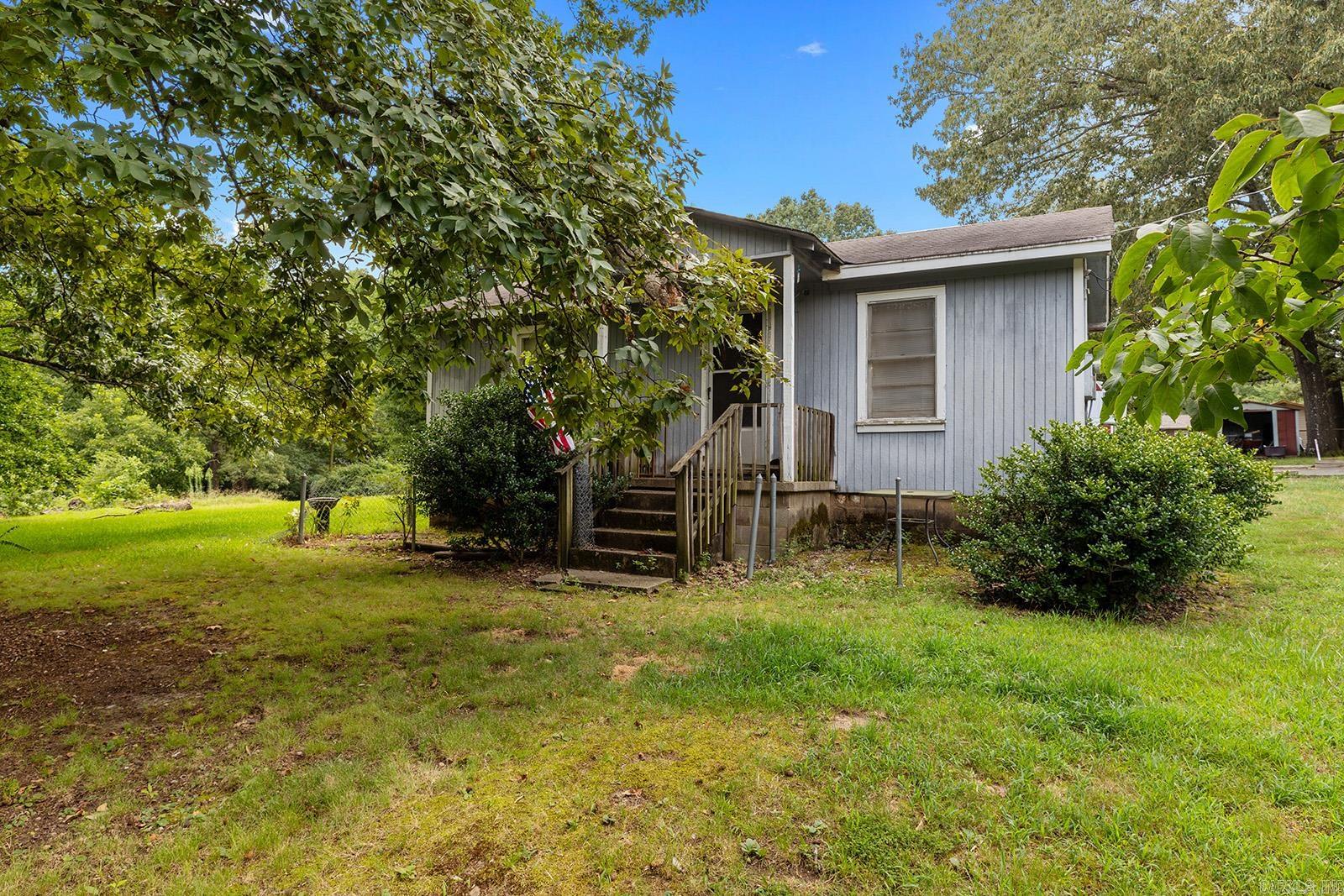 Take a look at this 2 bedroom, 1 bath fixer upper, that sits on a spacious 1.07 acre lot. It includes an eat-in kitchen, office, laundry room and bonus room ready for your vision. Surrounded by new construction homes and duplexes, this property is a great opportunity for a rental, flip project, or affordable primary residence in a growing area. Don't miss your chance to add value and bring this home back to life.