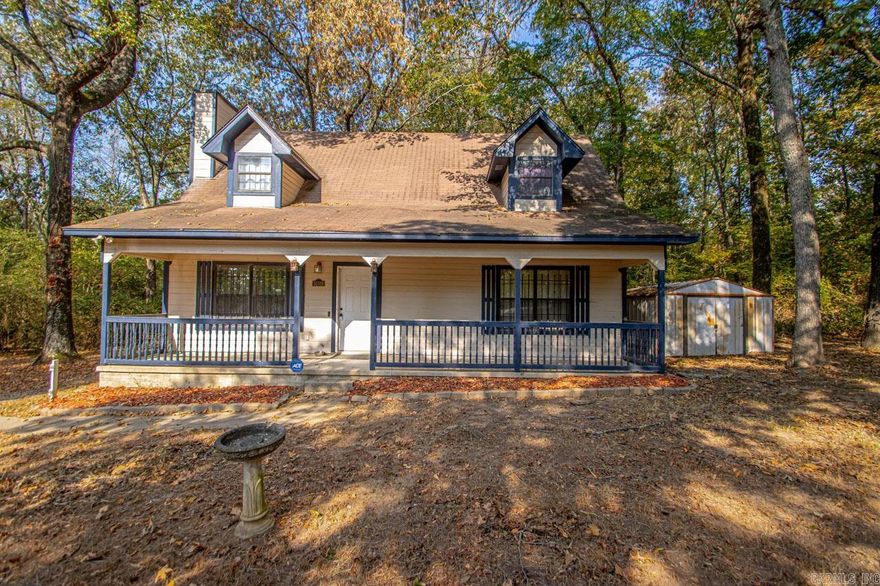 Welcome home to the country! Qualifies for USDA Rural Development Loan! This 3 bedroom 2 bath home sits on over 1.5 acres with hardwood trees, a storage building, a huge front porch, and more! The Primary bedroom is downstairs and the two additional bedrooms are upstairs! Call for a showing today!