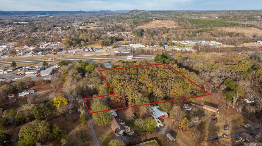 Perfect location to build your home. Convenient to the interstate.  Clear as many trees as you would like and leave as much privacy as you desire on this 7.10 acre tract.  Inside the city limits of Mayflower with all city utilities available power, water, and natural gas. Minimum build size 1000 sq. ft. home. No mobiles homes.