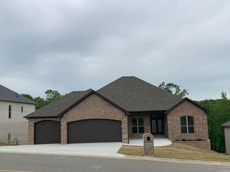 Awesome New Construction:  4 Bedroom, 3.5 baths, 3400 SF. home features a   Bonus room, 27x30 shop.  Open floor plan, luxury vinyl flooring.  Large laundry room with a sink and an abundance of cabinets, with access to the master closet.  Tiled walk-in shower, double vanity and soaking tub.  Kitchen features a large island, stainless steel appliances, painted cabinets, large pantry. Tankless hot water heater, Two decks, 3 car garage, under house storage.  Stairway to attic.  This house has an extra- large lot for a pool, also a green space in the back.   Enjoy the tranquility of a peaceful setting , the backyard is surrounded by nature and trees.