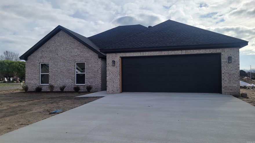 Beautiful new construction located in the new Pintail Pointe Subdivision in Manila. Home features LVP flooring throughout the entire home. Eat-in kitchen with center island and stainless-steel appliances. Split bedroom floor plan.  Primary suite features shower, soaking tub, and two walk-in closets. Separate laundry room.  Covered back patio and 2-car attached garage.