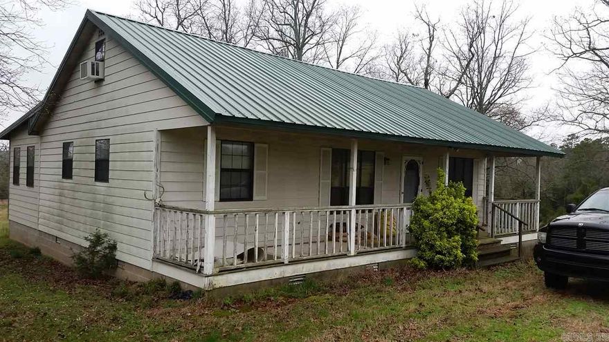 Looking for a secluded home on beautiful acreage? Look no further! This three bedroom/two bath home sits on approximately 24 acres of mixed woods and pines. Be sure not to miss the loft above the den which could be an additional bedroom. Wake up and drink your coffee with deer and turkey in the yard. Call today for an appointment! Agents, see remarks.