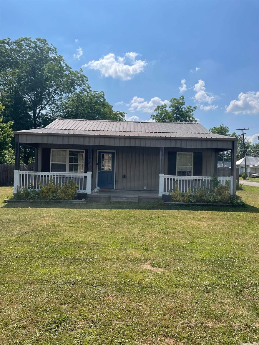 Beautiful, remodeled home on corner lot. Barn wood planked wood walls in bedrooms. 2 blocks from the school. Large fenced in backyard. Great starter home for a young family. Large front porch.