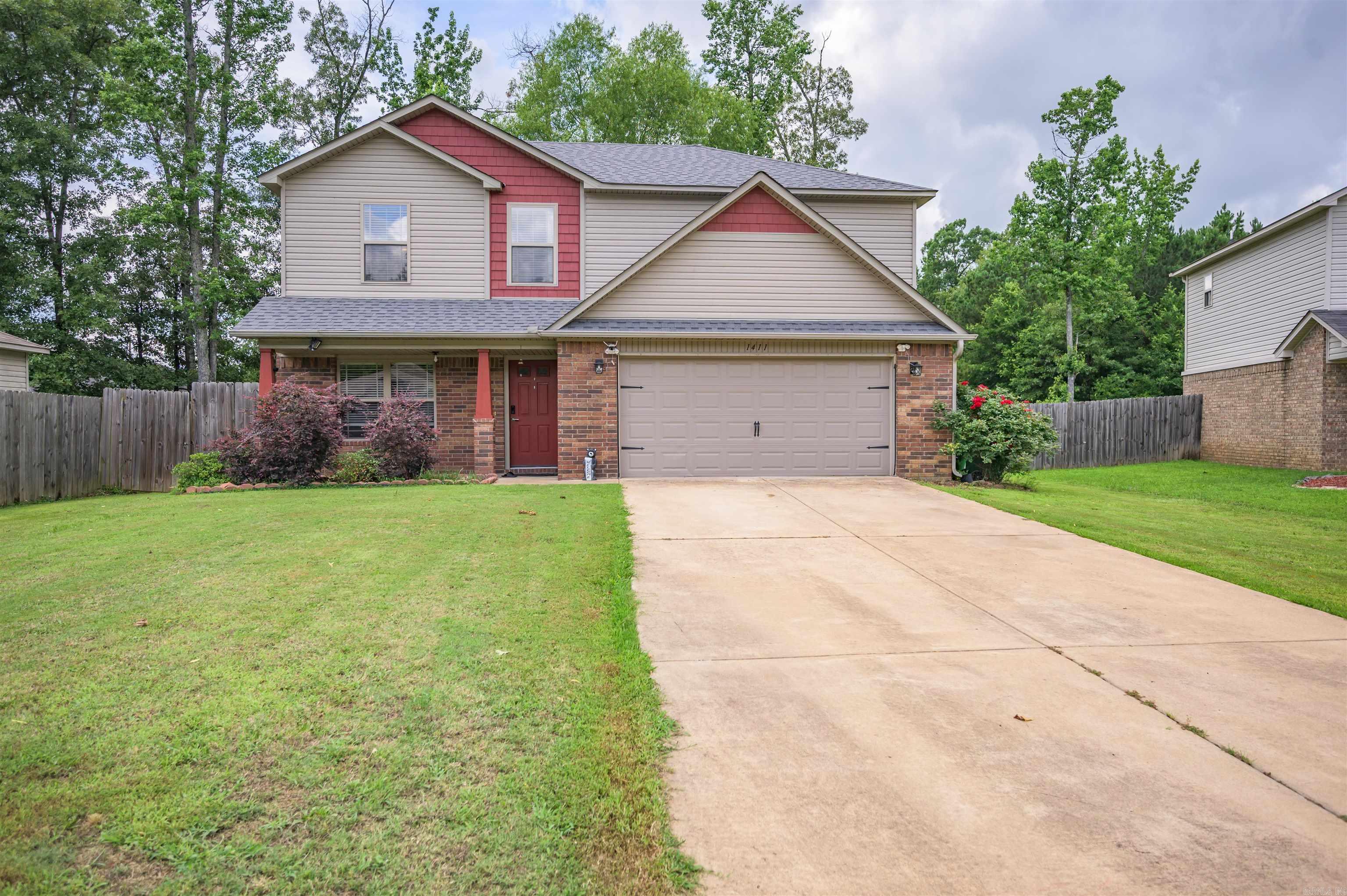 This fantastic 3-bedroom, 2.5-bath home has a great flow, with an open dining and living area that makes it easy to gather and relax. The galley-style kitchen is efficient and practical, and all the bedrooms are tucked upstairs along with a bonus living space—perfect for a playroom, office, or cozy hangout. One of the best features is out back: a big deck and a dedicated area for outdoor cooking and dining that’s just waiting to be enjoyed. 1411 Matehuala Boulevard has the kind of layout that just works! The roof was replaced earlier this year!