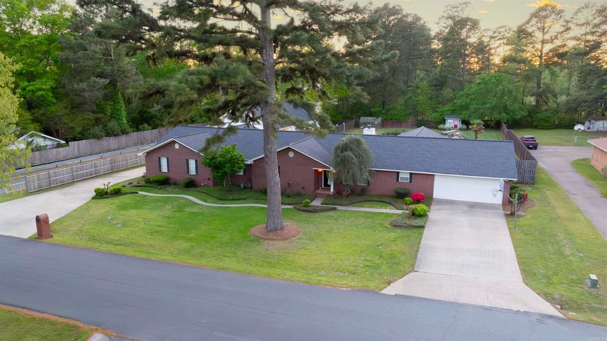 Discover the ultimate backyard oasis at 228 Evans Drive!   Located on a .86 acre lot within the Parkers Chapel School District, this remarkable 5-bedroom, 3-bathroom home, combines modern luxury with the comfort of home. Highlights include a spacious shop with a man cave and half bath, perfect for hobbies and relaxation.  The centerpiece? An AMAZING pool area, designed for both leisure and hosting unforgettable gatherings.