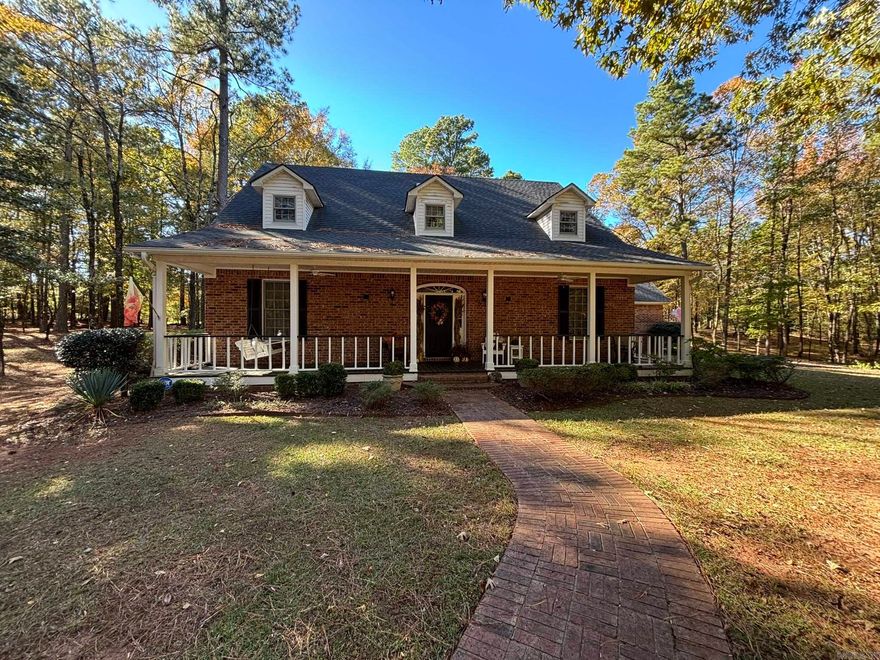 Welcome home to your own private slice of paradise! A circular drive leads you to this inviting 3BR, 2.5BA country retreat, complete with a wooded backdrop, lush landscaping, & a welcoming front porch perfect for relaxing. Step into the foyer w/ gleaming wood floors & an open floor plan. The family room features 2-story ceilings, custom brick fireplace, wall-to-wall bookcases, & windows overlooking the patio. The bright kitchen/dining area boasts a center island, quality appliances, & excellent storage. The formal dining room offers extra entertaining space. The primary suite is the perfect retreat w/ a walk-in closet & bath w/ 2 vanities, walk-in shower &, a large whirlpool tub. Upstairs, find 2 bedrooms, each w/ an attached bonus room. A full bath & balcony overlooking the family room complete the upper level. Outside, the barn is perfect for tools & ATVs, as well as a spacious double garage. The 3.6-acre lot is well-maintained, offering privacy, space, & charm in every direction. That’s not all – directly across the street is a 6-acre parcel with a spring-fed pond, included for even more outdoor enjoyment. Don’t miss this rare opportunity to own a beautiful country home!