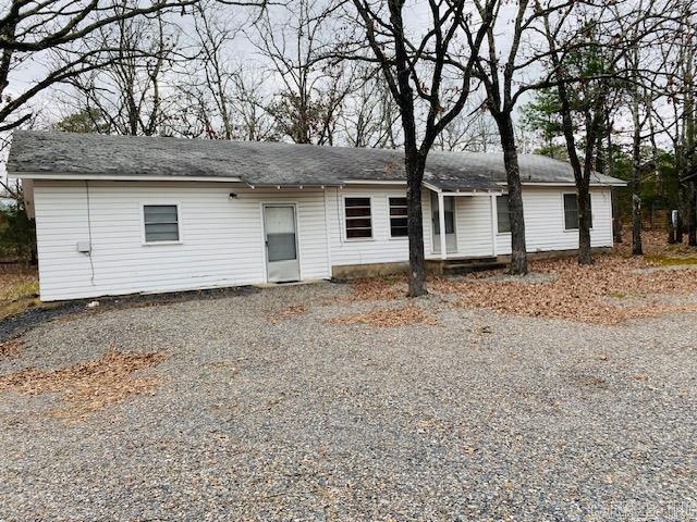 Location, Location, Location! Location is everything when buying a home. This home is in a prime spot, just under a mile from city limits and close to the golf course. A bit of a fixer upper, however has a large 2 car garage and a workshop with dual roll up doors and a concrete slab. home sits on 1 full acre. You can't beat the location. Give us a call for your showing today!