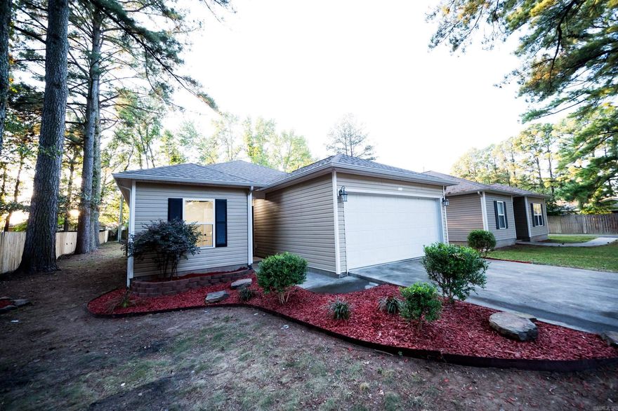 Recently renovated, this charming home is nestled in the heart of Cabot on a cozy lot with mature trees. It offers 3 bedrooms, 2 full baths, and an open living space with a split-bedroom floor plan. The galley-style kitchen features quartz countertops, white cabinets, and a breakfast bar. The primary bedroom is set apart at the back of the home with a spacious closet. The large backyard includes partial fencing, and the home is just moments away from interstate access, shopping, and dining.