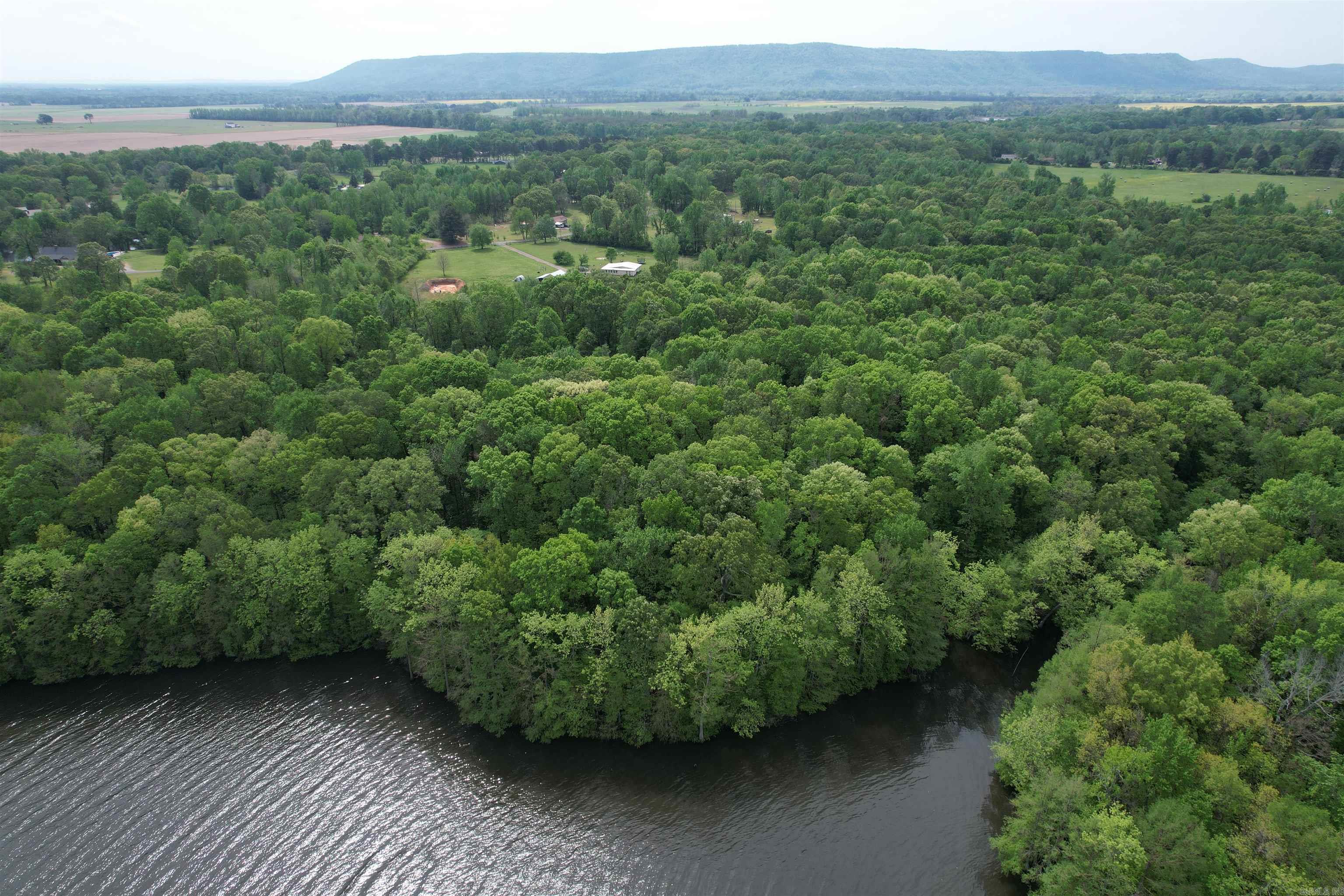 This stunning property includes lots of shorefront on Lake Atkins and is perfect for a beautiful lake front home. Build your dream home with a fantastic view of the lake and buy the adjoining 40 acres also for sale for a field for horses or cattle. This property is minutes from two boat launches and is less than an hour from Little Rock! Mineral rights convey!