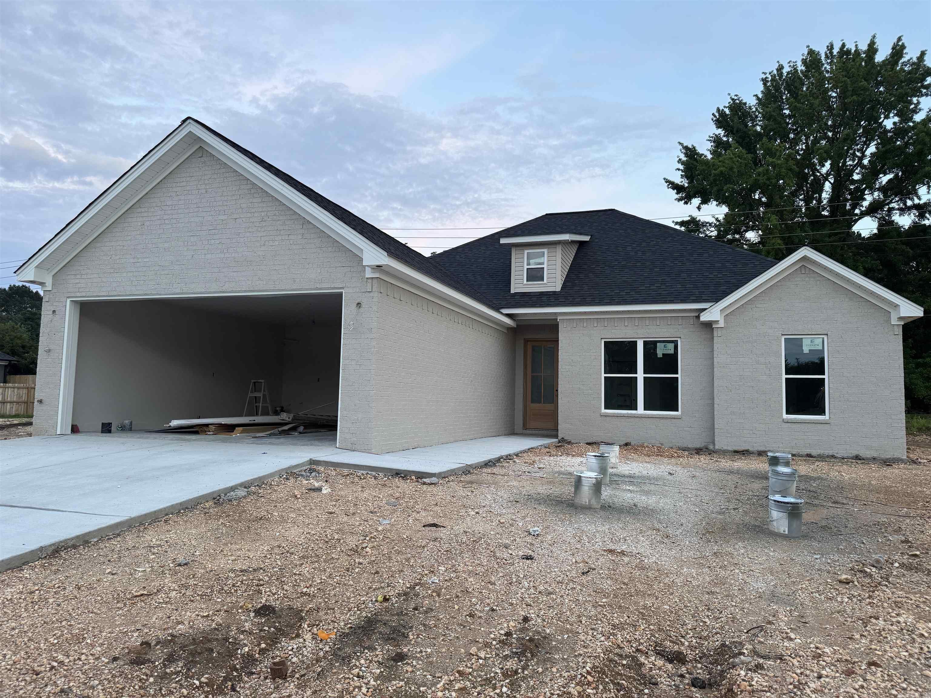 Beautiful, New Construction home built by Bragg & Kennedy Homes! Conveniently located to the interstate and shopping! This house has 10 foot ceilings in the living room, kitchen, & foyer. Living Room has gas log fireplace & large windows. Kitchen & Living Room are open to each other. Kitchen has quartz countertops & stainless appliances. 3 Guest bedrooms with 9ft ceilings that are separate from primary bedroom. Primary bedroom has tray ceiling, large windows. Primary bath has double vanities, linen closets, soaking tub, tile shower, & lots of cabinet space! Primary bath flows into large primary closet! Large laundry room w/large countertop space. Additional features include tankless water heater, LVP flooring, OVERSIZED GARAGE, Lockers with cubbies, & customized finishes! Open every Sunday! Agents see remarks!