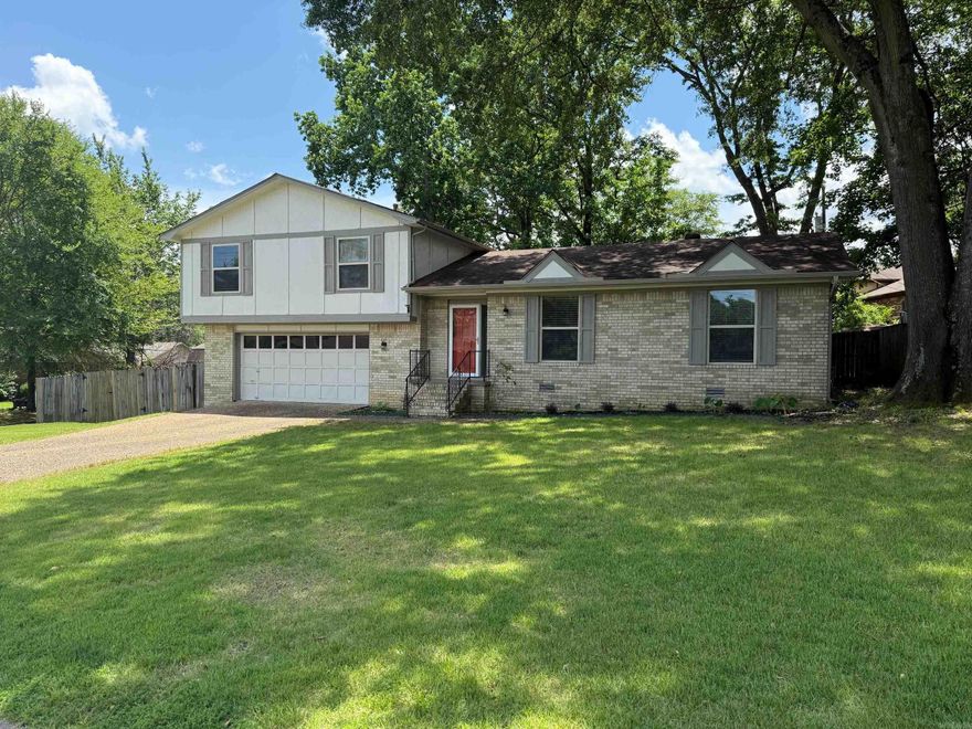 MOVE IN READY!  Home has a large backyard with double gate access.  Great deck and additional patio gives the outdoor space a lot of potential.   House sits on 1/3 of an acre.  Inside you'll find new flooring, fresh paint, and wonderful granite bathroom vanities.  The home has two living areas.  One with a wood burning fireplace that adjoins the kitchen.   Also space for a dining room table, and separate kitchen nook.  Double car garage finishes out the checklist.  Come see it !