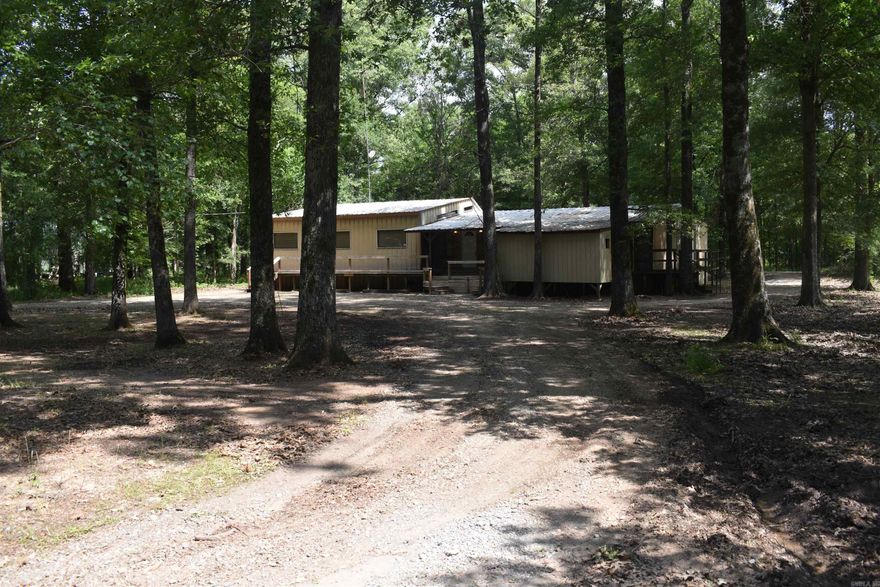 Rare opportunity to own a fully furnished camp.  The property is right down the road from Long Pond access, on the southern end of Bayou Meto WMA.  Saracen Casino is only approximately 20 miles away!    This spacious 2,320 sq ft, 5-bedroom, 4.5-bathroom camp is ideal for hunting groups.  The open-concept layout and recreational amenities make this a turn-key property you can enjoy from day one.